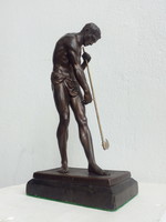 Reaper man with scythe, bronze statue