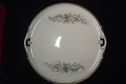 Large serving plate with handles.