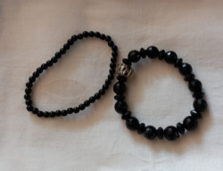 2 black bracelets
