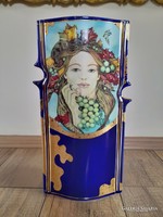 A rare large porcelain vase by a Hólloháza carver