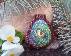 Painted unique pebble in pearl frame - eye