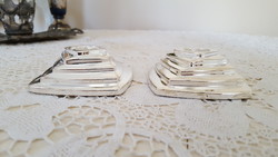 A nice pair of silver-plated, modern candle holders