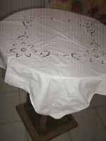 Beautiful white ruffled floral tablecloth