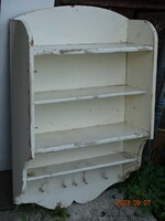 Old retro open wall-mounted spice storage shelf tool with hooks
