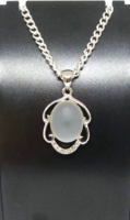 White matte titanium crystal oval cabochon pendant, cz stone filled silver socket f81791