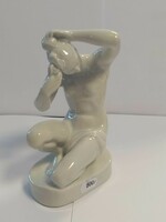 Antique porcelain female statue