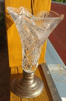 Crystal vase on a silver base