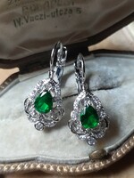 Old-style earrings set with green drop zirconia stones with snap closure