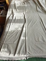 Old linen tablecloth with a lace edge