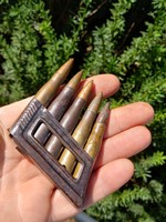 Mannlicher marked magazine + 5 rounds of ammunition.