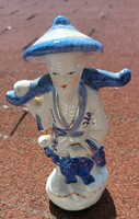 Oriental fisherman porcelain statue