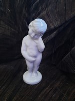 Unpainted porcelain figure mother's side