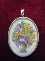 Antique pendant, lockwork, dried flowers in a vase.