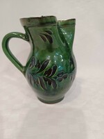 Green ceramic wine jug