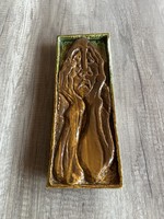 Thinking man signed wall ceramic.