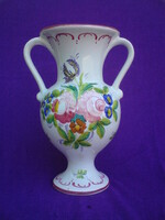 Gracefully shaped two-eared ceramic vase
