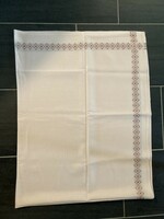 Old machine embroidered tablecloth