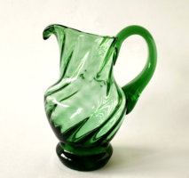 Old twisted green glass jug, spout