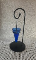Blue glass candle holder on a black metal stand number 1