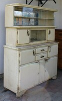 Antique kitchen cabinet with pull-out glass with flower pattern