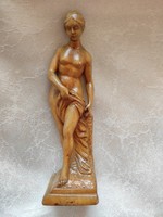 Female nude wooden figurine