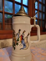 German ceramic beer mug with lid