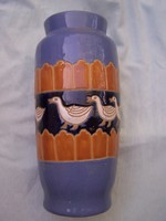 Ceramic vase with a row of geese