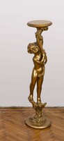 Gilded wooden pedestal with a child figure