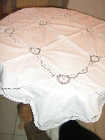 Beautiful handmade crocheted snow-white rosy tablecloth