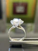 A wonderful silver ring with a large fiery zirconia stone