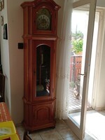 A clock in an oak case with a functioning antique clock mechanism, 2 meters long
