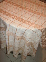 Elegant woven tablecloth with a beautiful cream-colored plaid floral fringed edge