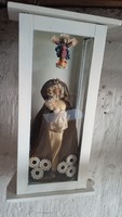 Cleaning the cellar in a small closet, Maria with her little one is a homemade altar