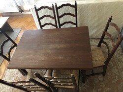 Wooden table with 6 chairs, wicker seat, the table can be opened to 190 cm