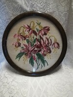 Old tapestry picture, in a round wooden frame