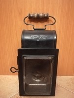 Old, original railway lamp with embossed mauve logo, bakter