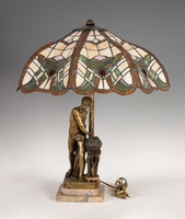 Tiffany-style table lamp with bronze figural base