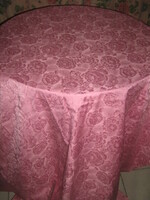 Beautiful vintage full of roses on damask tablecloth