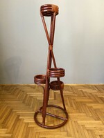 Wicker painted burgundy colored reed flower stand