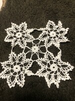 Little stars crocheted from lace. Handicraft decoration table centerpiece