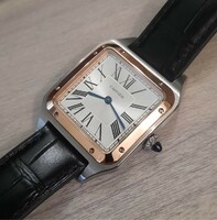 Beautiful elegant iconic cartier santos steel / gold is the object of the bid