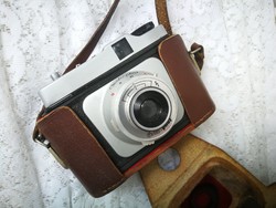 Old camera in leather case