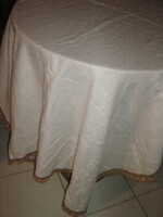 Beautiful white lacy edged woven tablecloth