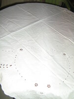 Beautiful antique vintage handmade madeira embroidered on white tablecloth