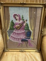 Girl with a violin - tapestry picture, handmade, in a graceful glazed, gilded picture frame.