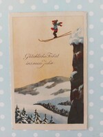 Old Christmas card postcard boy skiing