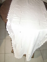 Beautiful azure embroidered crocheted white tablecloth runner with lace edge