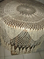 Beautiful ecru hand-crocheted round lace tablecloth