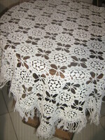 Beautiful white hand crocheted fringed lace tablecloth