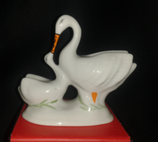 Little feeding swan / figured porcelain sculpture